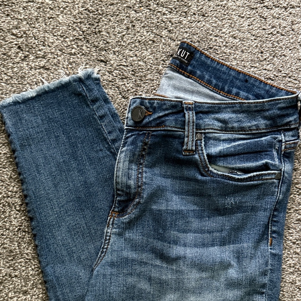 Kut from the Kloth- Connie ankle skinny. Light distressing/fray at the ankle